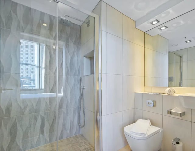 Modern shower toilet and sink bathroom at Manchester Victoria in Manchester Student Accommodation