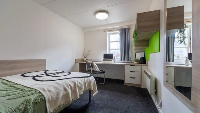 Bed desk laptop chair and heater Bedroom at Manchester Student Village in Manchester Student Accommodation