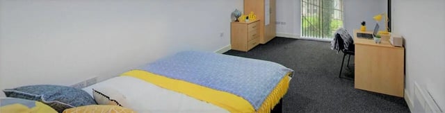 Bed desk globe dresser and bed Bedroom at The Grafton in Manchester Student Accommodation