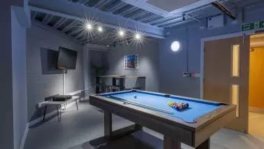 Pool table television and seating playing area at iQ Broderick House in Birmingham Student Accommodation