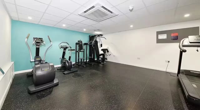 Elliptical cross trainer exercise bikes gym equipment treadmill gym at The Mill House in Edinburgh Student Accommodation