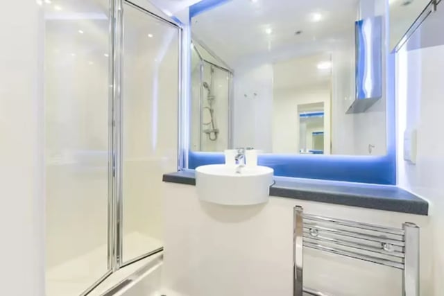 Modern bathroom with sink shower and heated towel rail bathroom at The Towpath in Chester Student Accommodation