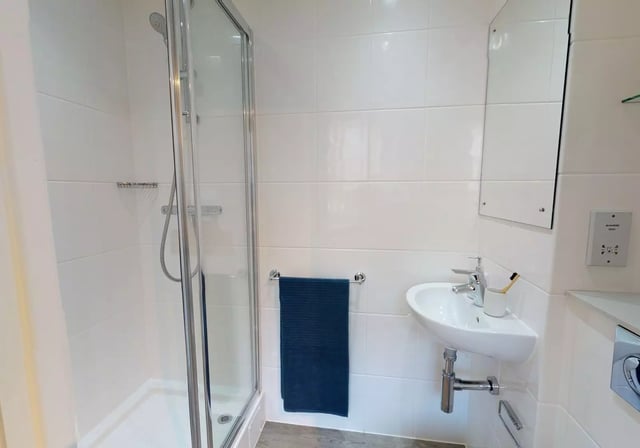 Shower sink and towel bathroom at iQ Sawmills in Brighton Student Accommodation
