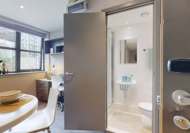 Study desk chair dining table and bathroom ensuite at Waterlane House in Bristol Student Accommodation