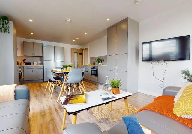 Sofa television dining table kitchen living room at iQ Weaver Place in Coventry Student Accommodation