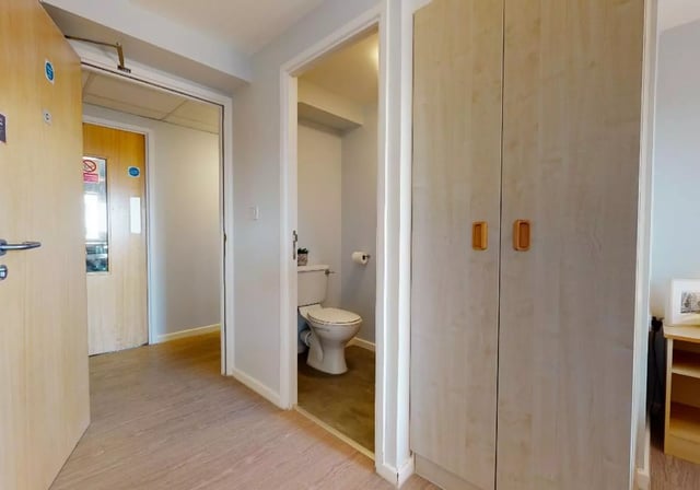 Toilet and wardrobe in hallway Image at Opal Court Leicester in Leicester Student Accommodation