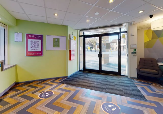 QR code sign chair and front entrance area at Opal Court Leicester in Leicester Student Accommodation