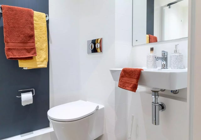 Toilet sink towels and toilet roll bathroom at iQ Vega London in London Student Accommodation