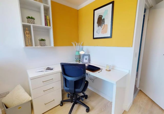 Desk chair laptop picture frame study area at iQ Haywood House in London Student Accommodation