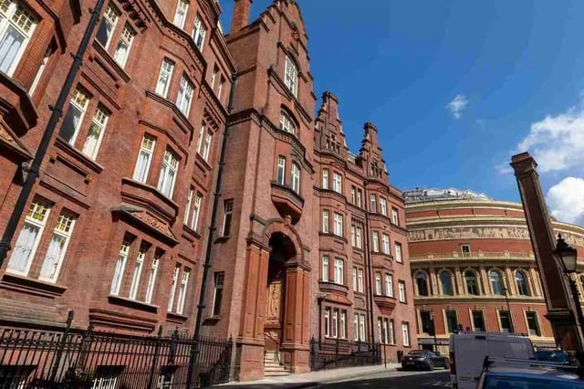 Red brick building with ornate windows exterior at Queen Alexandra's House in London Student Accommodation