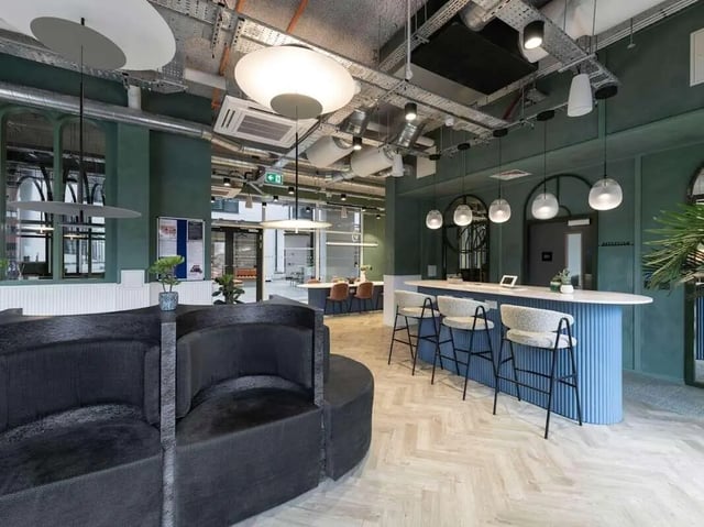 Dark modular couch bar stools and counter area communal space at Alma Place in Belfast Student Accommodation