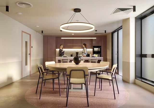 Round dining table with chairs kitchen area at Longwood Place in Coventry Student Accommodation