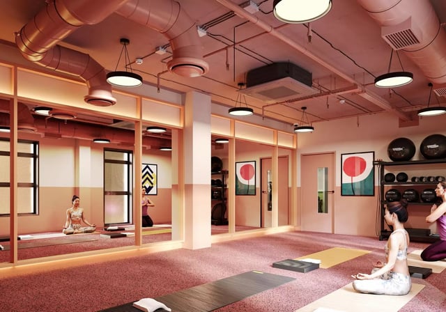 Yoga studio with women meditating and exercise equipment Studio at Longwood Place in Coventry Student Accommodation