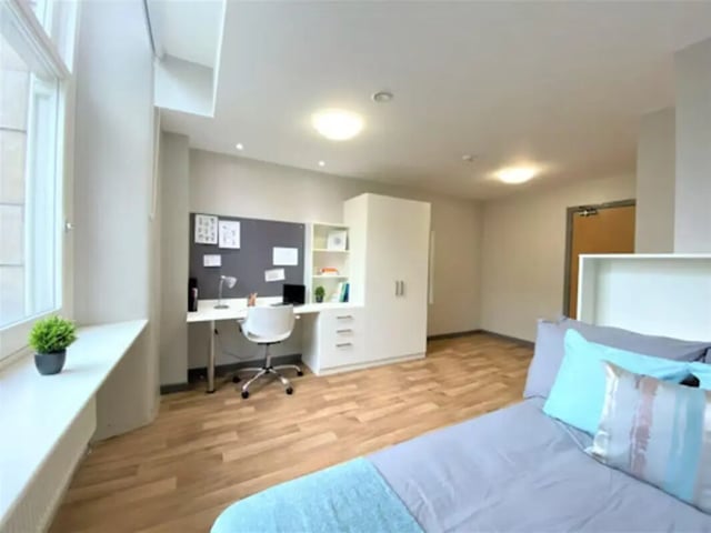 Desk bed wardrobe and bed Bedroom at John Bell House in Belfast Student Accommodation