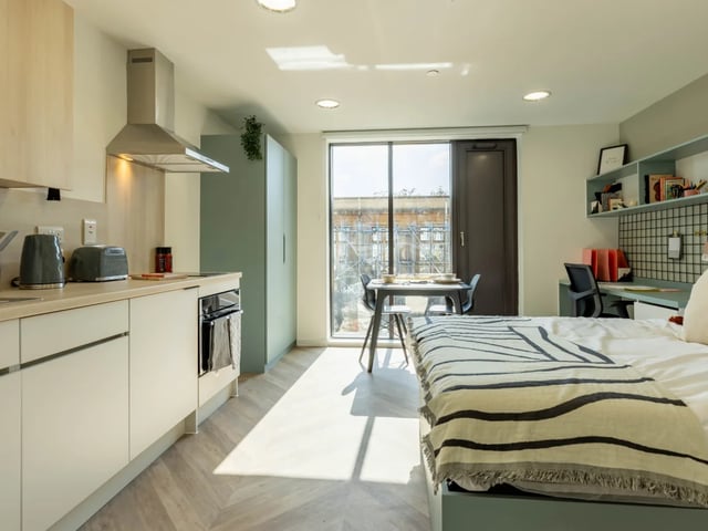 Kitchen bed desk and table student studio at The Brook in Bath Student Accommodation