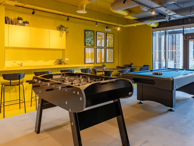 Foosball table and pool table common area at The Brook in Bath Student Accommodation