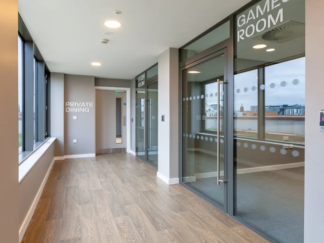 Hallway with private dining and game rooms exterior at The Brook in Bath Student Accommodation