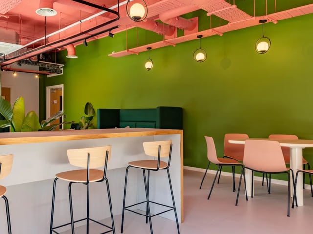 Bar stools and dining chairs in communal area at The Brook in Bath Student Accommodation