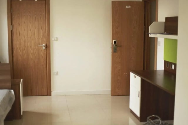 Two doors desk and bed Bedroom at The Brook in Bath Student Accommodation