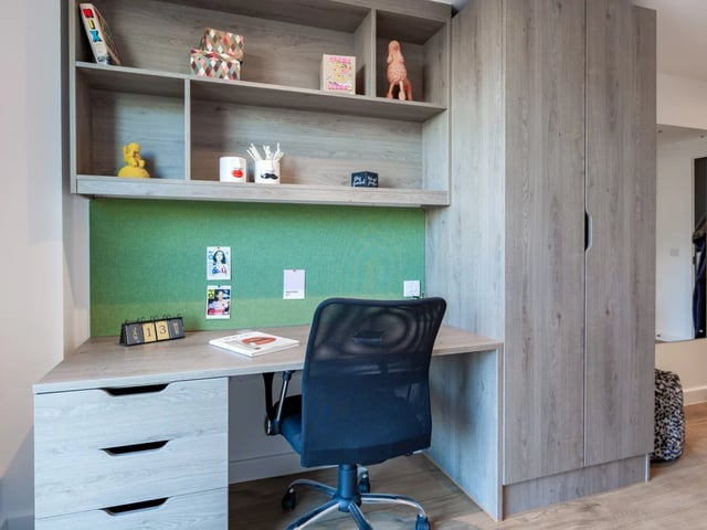 Desk chair calendar book and shelves Study area at Pavilion Point in Brighton Student Accommodation