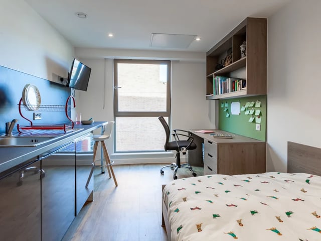 Bed desk kitchen and television study area at Pavilion Point in Brighton Student Accommodation