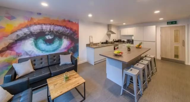 Sofa kitchen island with stools communal living kitchen at Abeleven in Aberdeen Student Accommodation