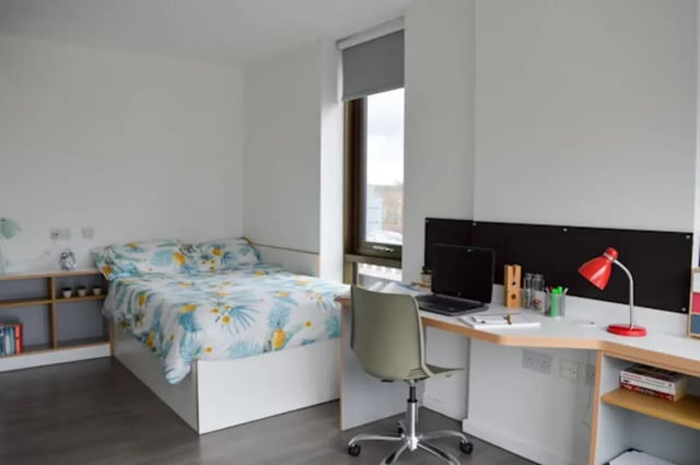 Bed laptop desk chair shelf study area bedroom at Byrom Point in Liverpool Student Accommodation