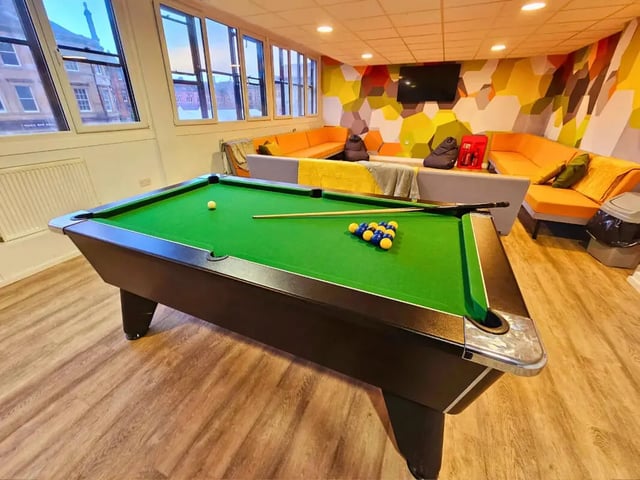 Pool table with balls and cue lounge area living room at MyPad Paisley in Paisley Student Accommodation