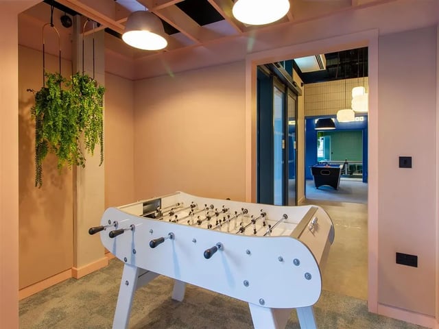 Foosball table and pool table common area at Calico in Liverpool Student Accommodation