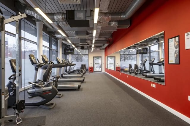 Gym equipment including treadmills and recumbent bikes gym room at Fitzroy Court in Luton Student Accommodation