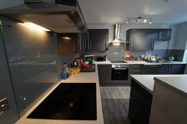 Modern grey cabinets with appliances kitchen at Middle Street - Nottingham in Nottingham Student Accommodation
