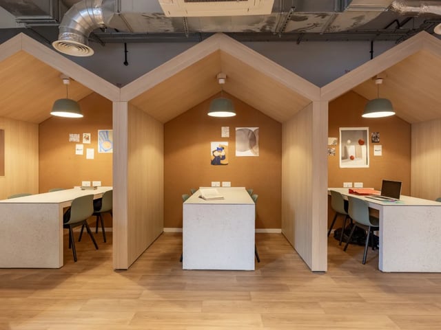Study pods with desks chairs and laptop study area at The Waterways Nottingham in Nottingham Student Accommodation