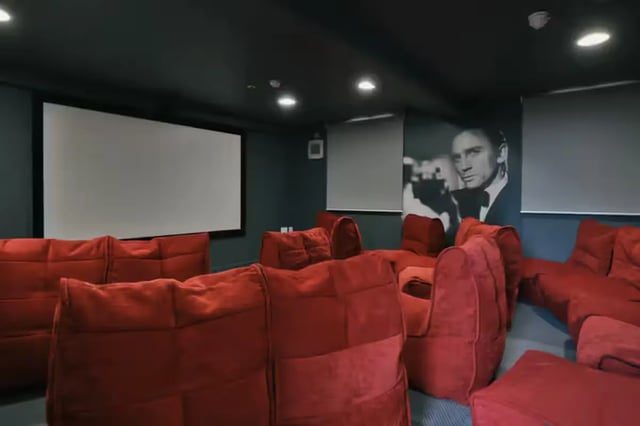Movie room with red beanbags and screen Cinema room at Provincial House in Sheffield Student Accommodation