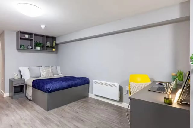 Bed side table shelf and desk student bedroom at Allen Court in Manchester Student Accommodation