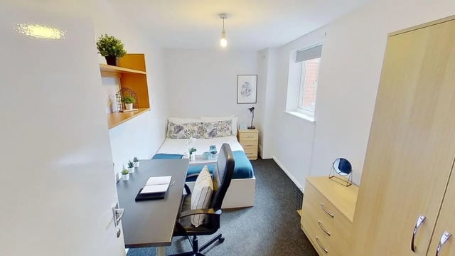 Bed desk chair and wardrobe bedroom at 6 Albert Square in Nottingham Student Accommodation