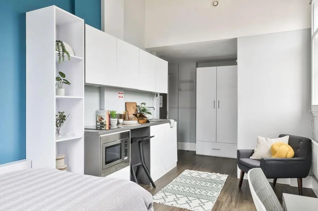 Studio apartment with bed microwave kitchen chair Living room at The Hahnemann Building in Liverpool Student Accommodation