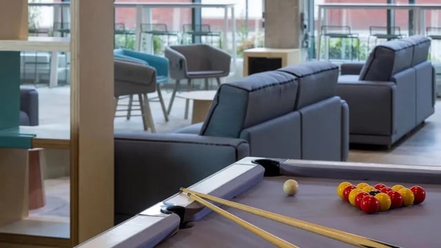 Billiard table with balls and cues common area at Lace Market Studios in Nottingham Student Accommodation