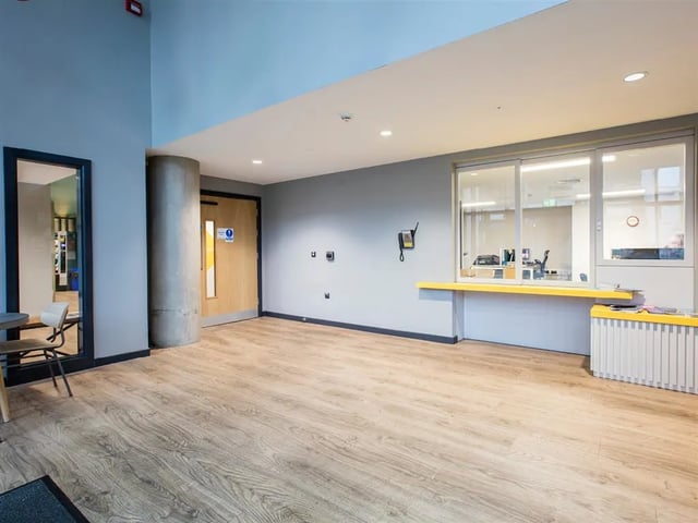 Reception desk and counter area common room at Botanic Studios in Belfast Student Accommodation