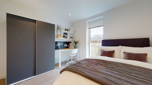 Wardrobe bed desk and chair bedroom at One London Road in Newcastle Under Lyme Student Accommodation