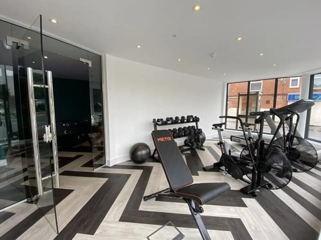 Dumbbells bench exercise bikes and treadmill gym at Dojo House Nottingham in Nottingham Student Accommodation