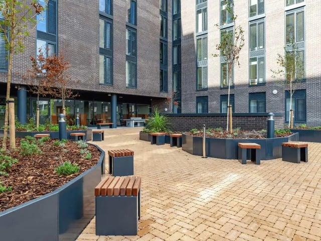 Courtyard with benches and planters exterior at Ty Nant in Swansea Student Accommodation