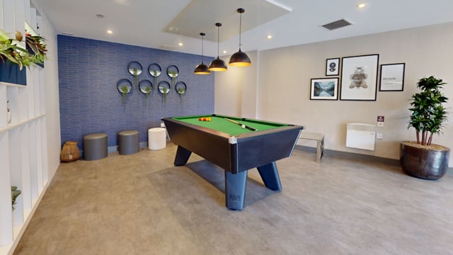 Pool table with balls and cues gaming area at 33 Parkside in Coventry Student Accommodation