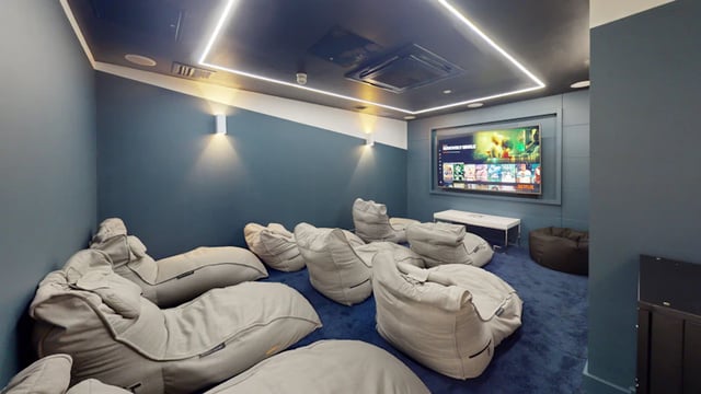 Beanbag chairs and large screen TV playing area at 33 Parkside in Coventry Student Accommodation