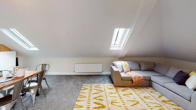 Sofa dining table and chairs living room at Picton Manor in Newcastle Upon Tyne Student Accommodation
