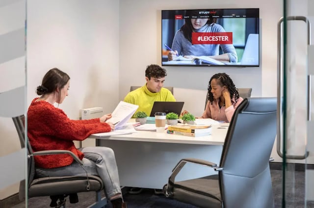 Students working at desk with laptop screen study area at Reynard House in Leicester Student Accommodation