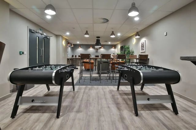 Foosball tables furniture and seating common area at William & Matthew House in Bristol Student Accommodation