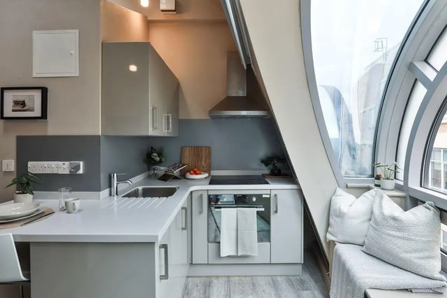 Modern kitchen with oven sink and window seating kitchen at William & Matthew House in Bristol Student Accommodation