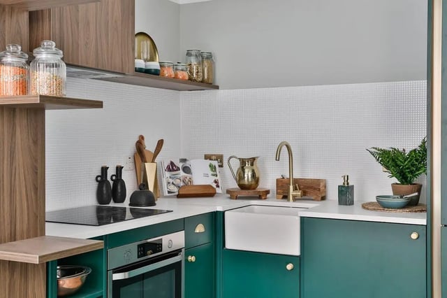Kitchen with green cabinets sink and oven kitchen at South Bridge in Edinburgh Student Accommodation