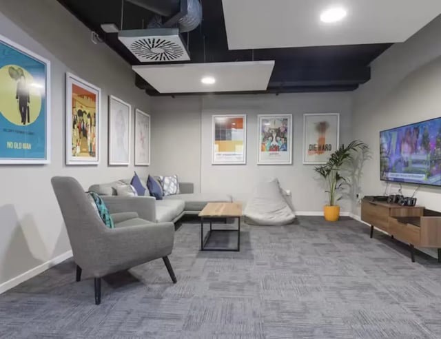 Gray sofa beanbag and TV living room at Pittodrie Street in Aberdeen Student Accommodation