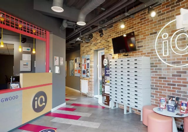 Reception desk lockers and TV common area at iQ Collingwood in Newcastle Upon Tyne Student Accommodation